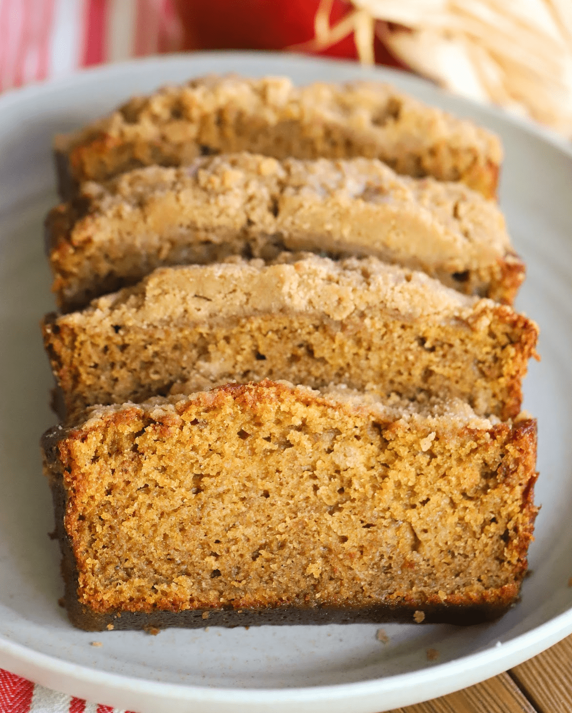 apple cider cinnamon streusel loaf sliced and plated