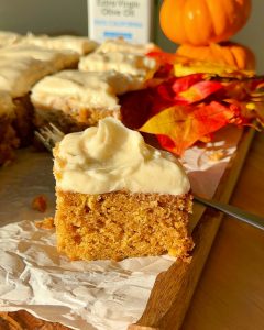 pumpkin sheet cake frosted and sliced