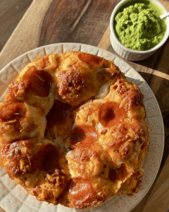 Savory monkey bread made with soft, cheesy pull-apart dough and served with a bright scallion oil for dipping.
